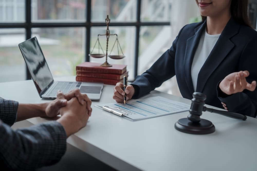 Legal discussion between personal injury lawyer and client.