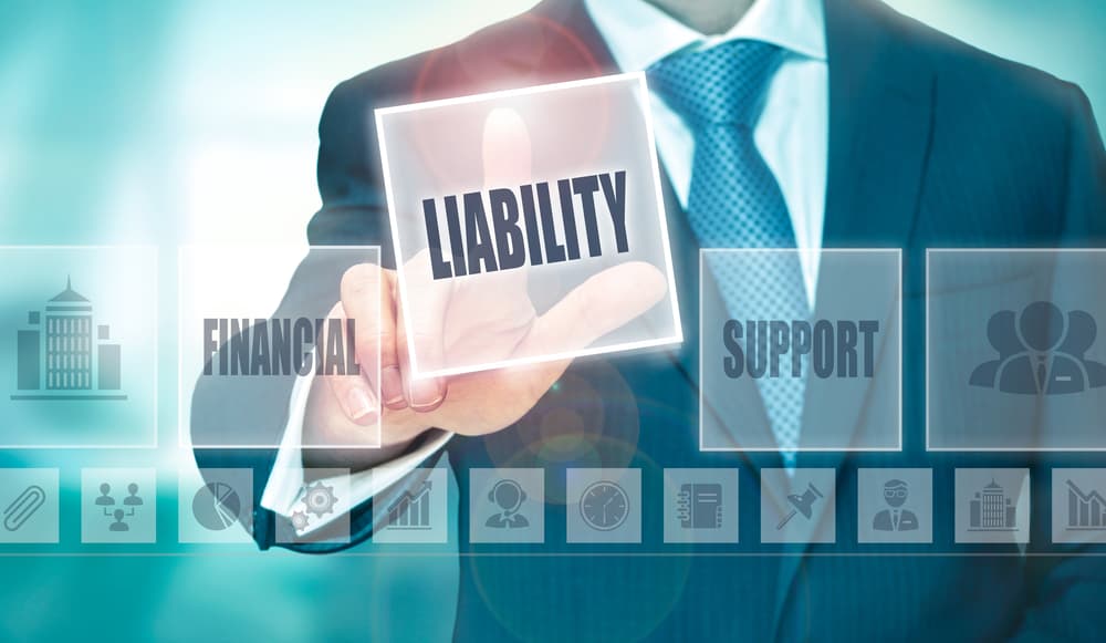 A lawyer tapping the "Liability" option on a translucent touchscreen.