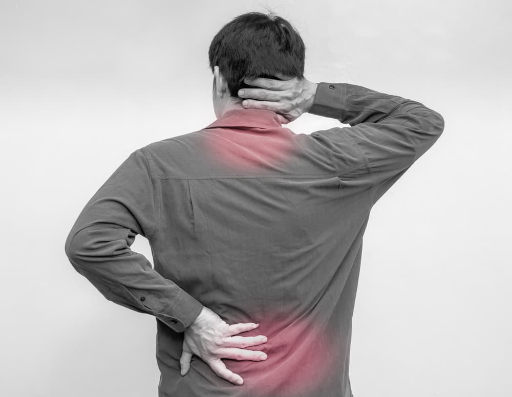 whiplash injuries - pain iin neck and back of a person