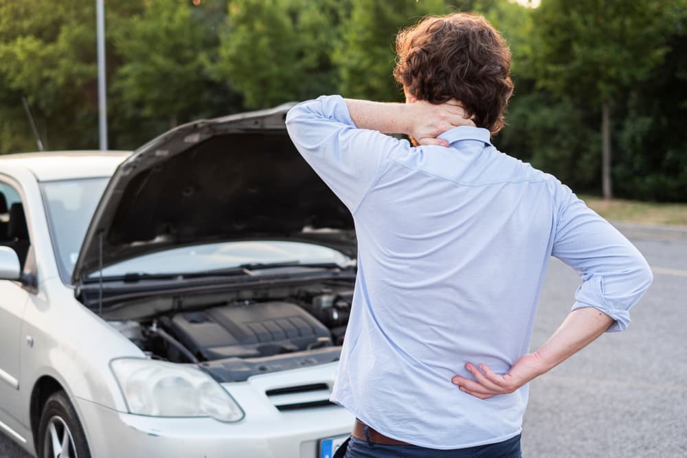 Man suffering Whiplash after hit by a car