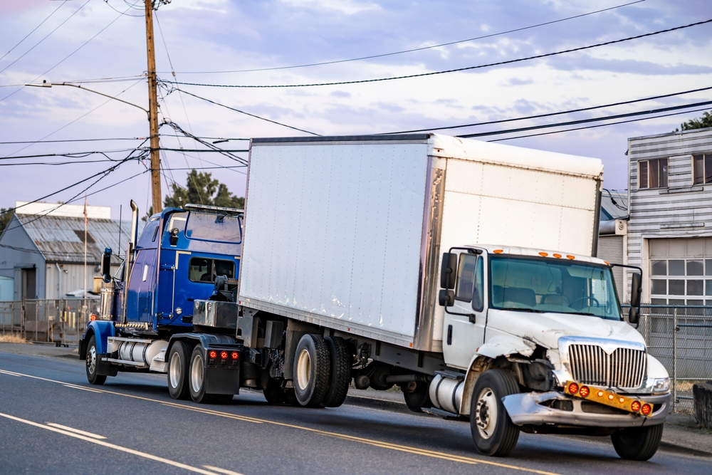 Alt Text: Learn about the types of damages you can claim after a truck accident, including medical costs and lost income.