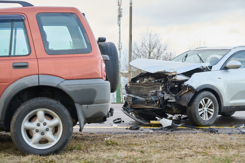 Two damaged vehicles after a collision, representing cases handled by a Gainesville car accident lawyer.