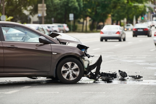 Front-end vehicle damage after collision at intersection, case handled by a Gainesville car accident lawyer.