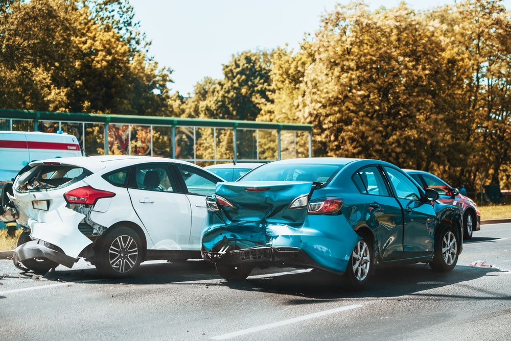 Rear-end car accident scene with visible damage, situation reviewed by a Gainesville car accident lawyer.