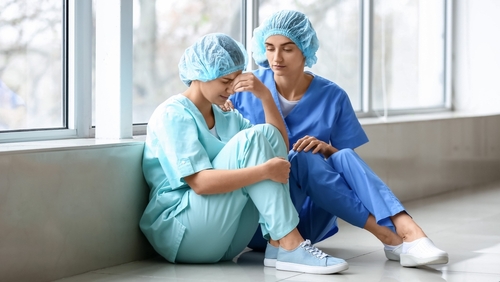 Comparative negligence in Florida wrongful death cases affects compensation as medical professionals support a grieving individual.