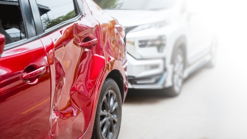 Gainesville car accident lawyer explains Florida comparative negligence law showing vehicle damage after a rear-end collision.