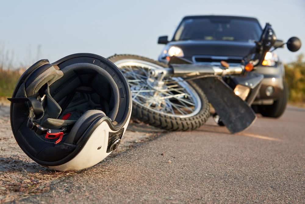 Damaged helmet on the road, a critical piece of motorcycle accident evidence used to prove fault