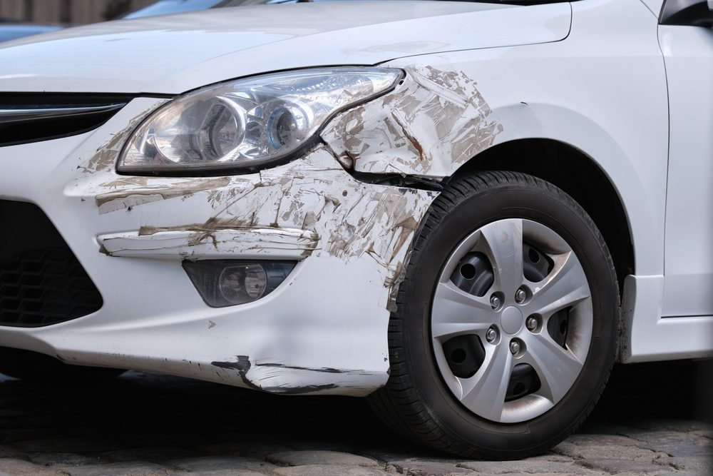 Vehicle damage with paint transfer from a hit-and-run crash
